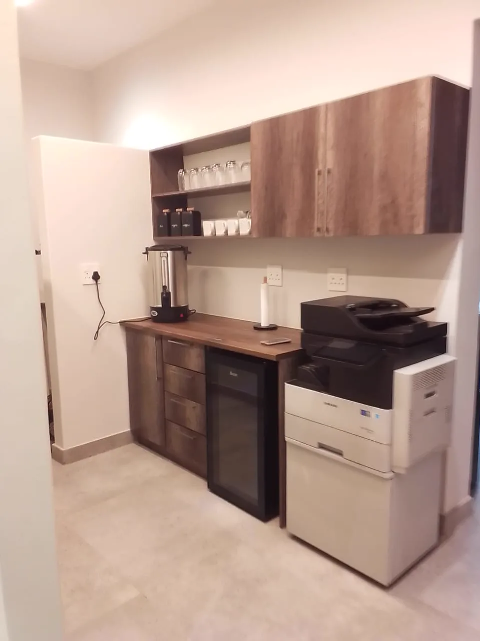 13 Private Road kitchenette and print area with storage cabinets